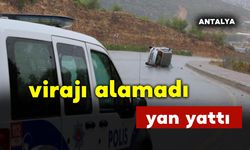 Yağmurlu havada virajı alamadı yan yattı: 2 yaralı