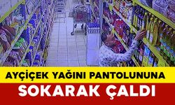 Ayçiçek yağını pantolonunun içine sokarak çaldı