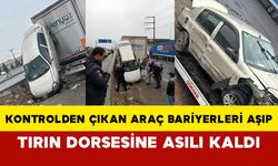 Sakarya'da kontrolden çıkan araç bariyerleri aşıp tırın dorsesine asılı kaldı