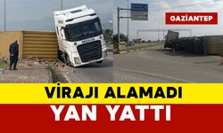 Tırın dorsesi virajı alamadı yan yattı