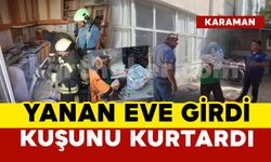 Yanan eve korkusuzca girdi, kuşunu kurtardı