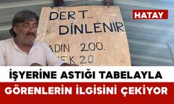 İş yerine astığı tabelayla görenlerin ilgisini çekiyor