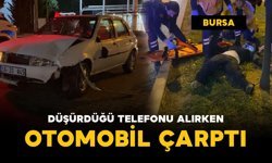 Düşürdüğü telefonu alırken otomobil çarptı: genç yaralandı