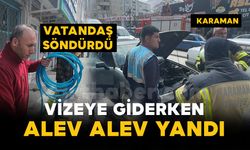 Otomobildeki yangını çevredeki esnaf söndürdü