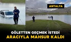 Göletten geçmek isterken mahsur kaldı