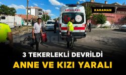 Kavşakta devrilen 3 tekerlekli bisikletteki anne ve kızı yaralandı