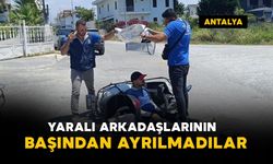 Yaralı arkadaşlarının başından ayrılmadılar