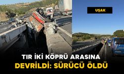 Tır, iki köprü arasına devrildi: sürücü öldü