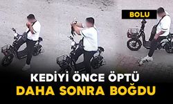 Sokak ortasında yavru kediyi önce öptü, sonra boğdu
