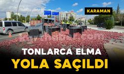 Karaman'da elma yüklü kamyonetin kasasındaki tonlarca elma yola saçıldı