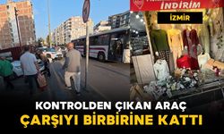 İzmir'de kontrolden çıkan otomobil çarşıyı birbirine kattı