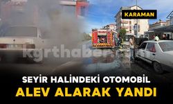 Karaman'da seyir halindeki otomobil motor kısmından alev alarak yandı