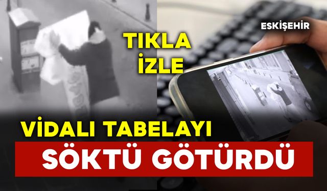 Vidalı tabelayı söken kadın görüntüyü izleyenleri şaşırttı