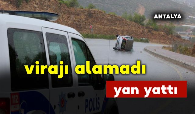 Yağmurlu havada virajı alamadı yan yattı: 2 yaralı