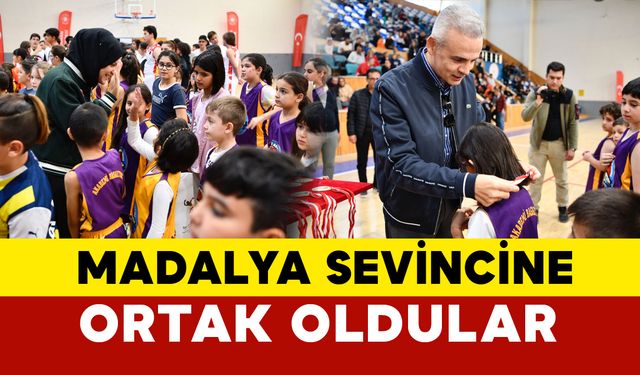 Vali Çiçekli ve eşi madalya sevincine ortak oldular