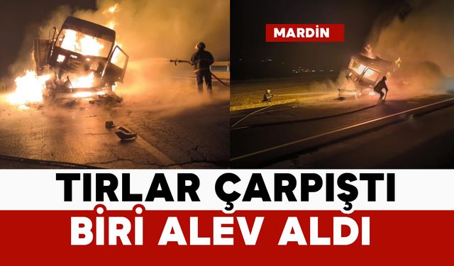 Çarpışan iki tırdan biri alev aldı