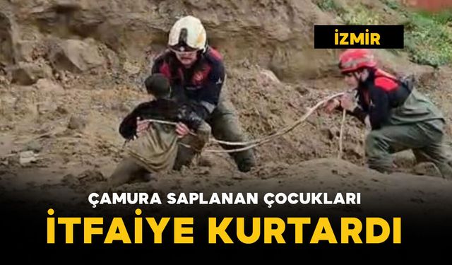 Çamura saplanan çocukları itfaiye kurtardı