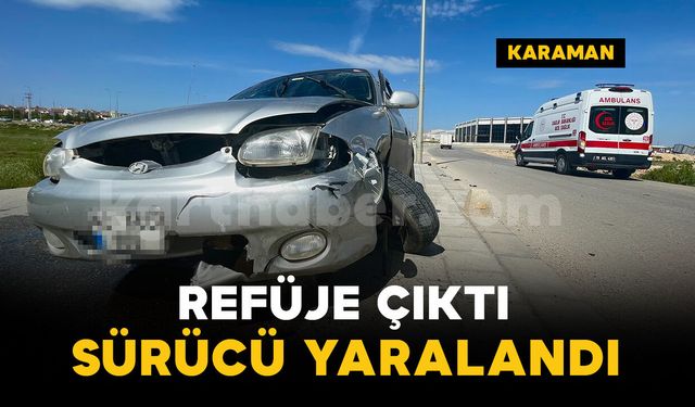 Otomobil refüjdeki beton dubanın üzerinde asılı kaldı: 1 yaralı