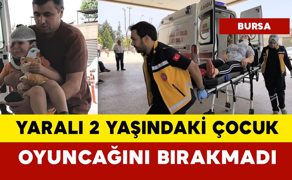 Kazada yaralanan 2 yaşındaki çocuk oyuncağını bırakmadı