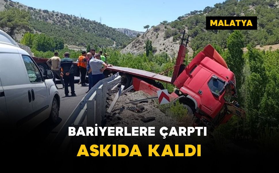 Bariyerlere çarparak askıda kaldı